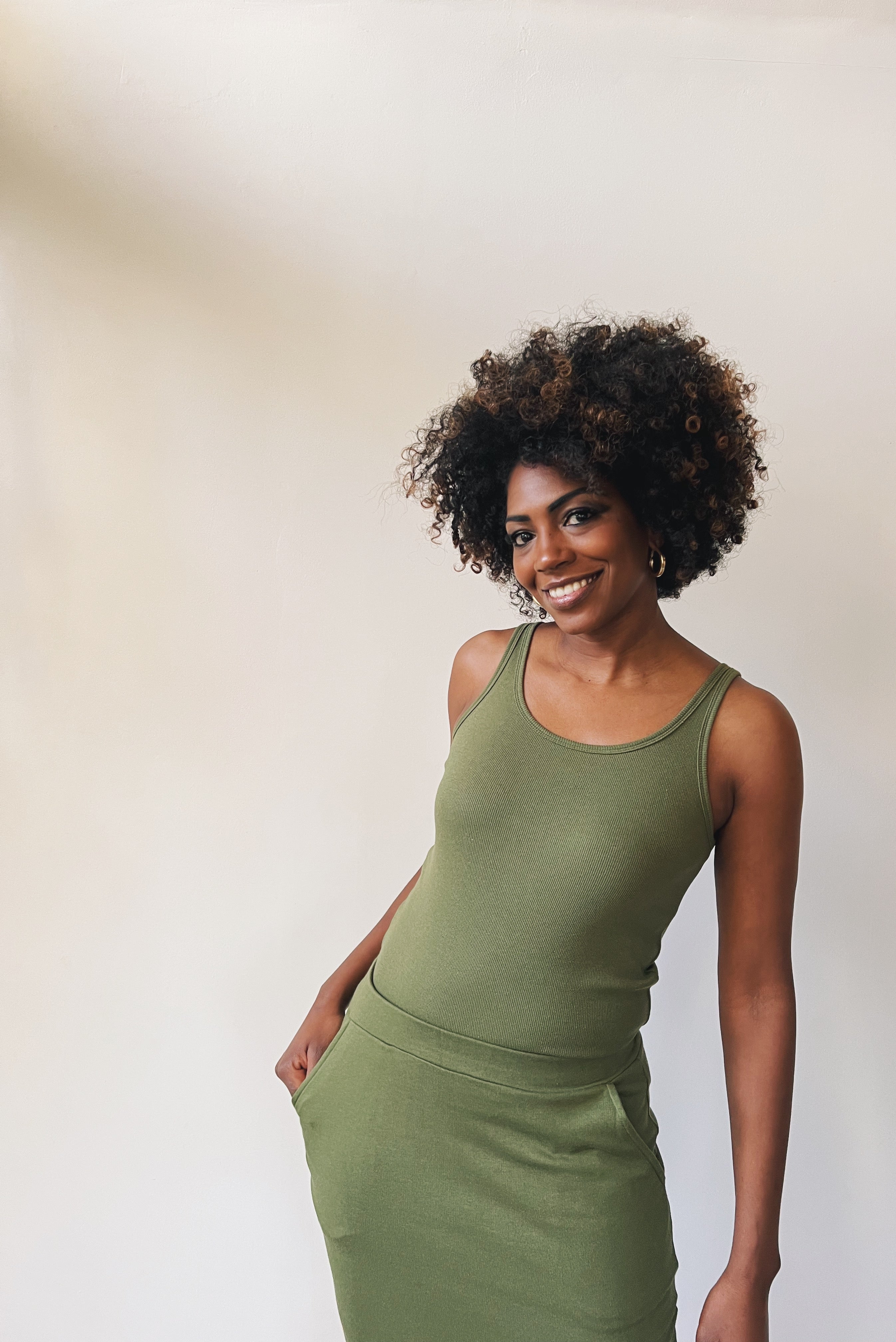 Tanktop in soft rib with open neck and fine shoulder straps.